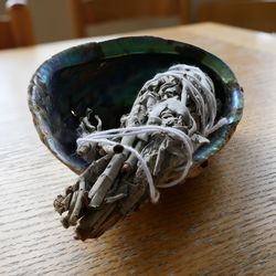 High angle view of bread in container on wooden table