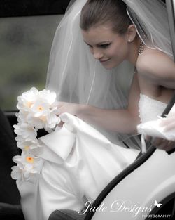 High angle view of woman with white flowers