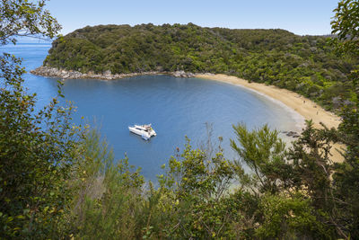 High angle view of boat sailing on sea against sky