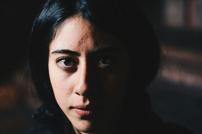 Close-up portrait of a young woman