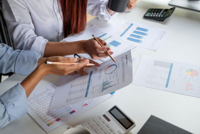 High angle view of woman working on table