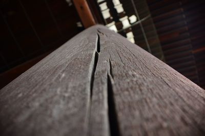 Close-up of wooden plank on table