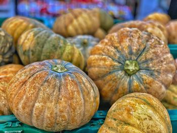 Close-up of pumpkins for sale at market stall
