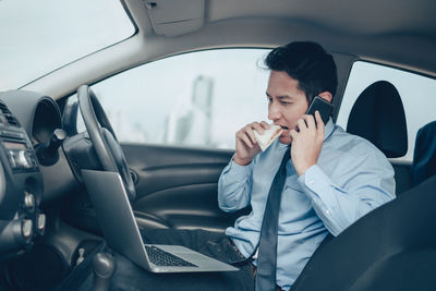 Young man using mobile phone