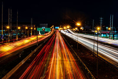 High angle view of light trails on street at night