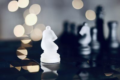 Close-up of illuminated chess pieces