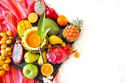 High angle view of fruits against white background