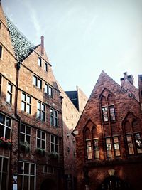 Low angle view of old building against sky