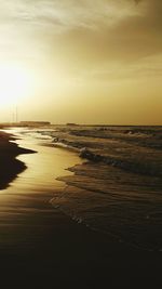 Scenic view of sea against sky at sunset