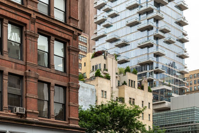 Low angle view of buildings against clear sky