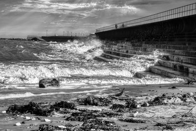 Scenic view of bridge over sea against sky