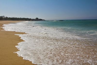 Scenic view of sea against clear sky