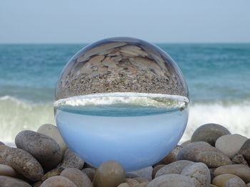 Close-up of stones on beach