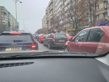 Cars on street in city