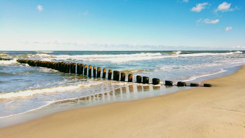 Scenic view of beach against sky
