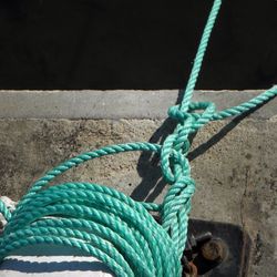 Close-up of rope against blue sky