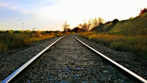 Railroad track passing through landscape