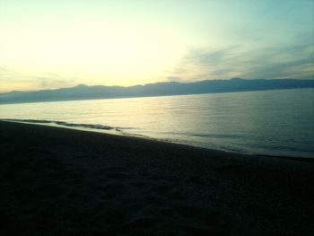 Scenic view of sea at sunset