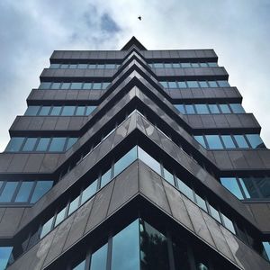 Low angle view of modern building against sky