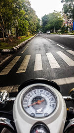 View of street through car windshield