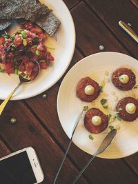 Close-up of serving food on table