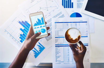 Cropped image of business colleagues working in office