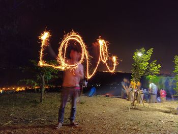 Firework display at night
