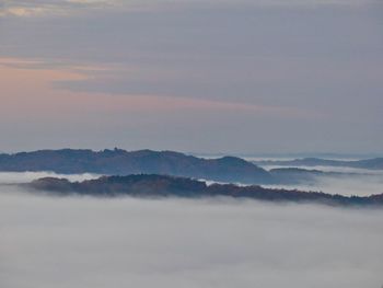 Scenic view of mountains against sky during sunset