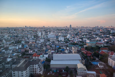 High angle view of townscape against sky during sunset