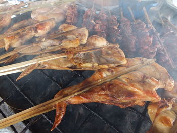 Close-up of meat on barbecue grill