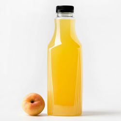 Close-up of fruits in glass on table against white background