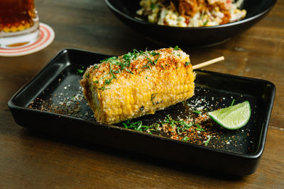 High angle view of fish in plate on table