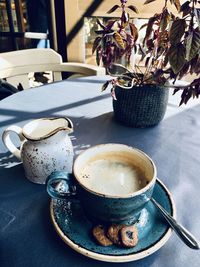 Close-up of coffee cup on table