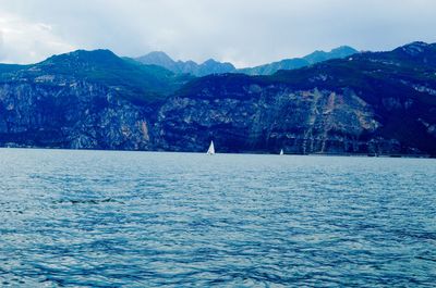 Scenic view of mountains by lake