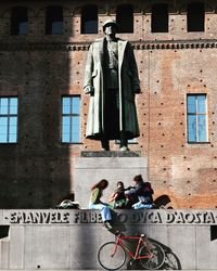 People in front of building