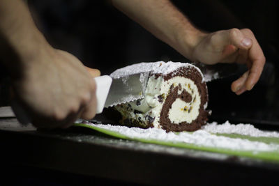 Close-up of hand holding ice cream