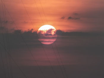 Close-up of sunset against sky