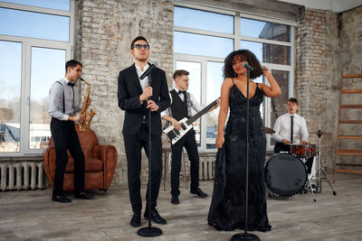 Side view of man using mobile phone