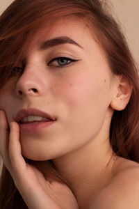 Close-up portrait of young woman
