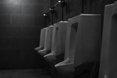 Close-up of empty seats in bathroom