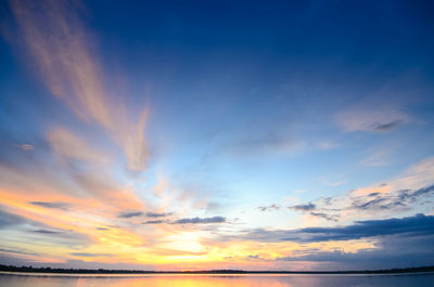 Low angle view of sea against sky during sunset