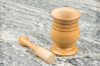 Close-up of wooden container on table