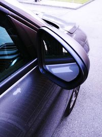 Close-up of car on side-view mirror