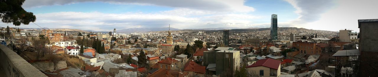 Panoramic view of city against sky