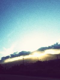 Scenic view of landscape against sky at sunset