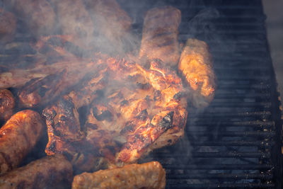 Close-up of meat on barbecue grill