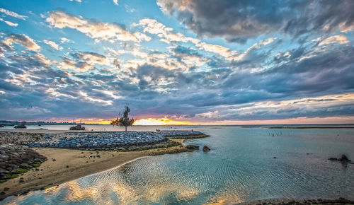 Scenic view of sea against sky during sunset