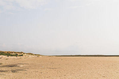 Scenic view of desert against sky