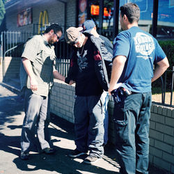 People standing on street in city