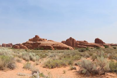 Rock formations at arches national park against sky